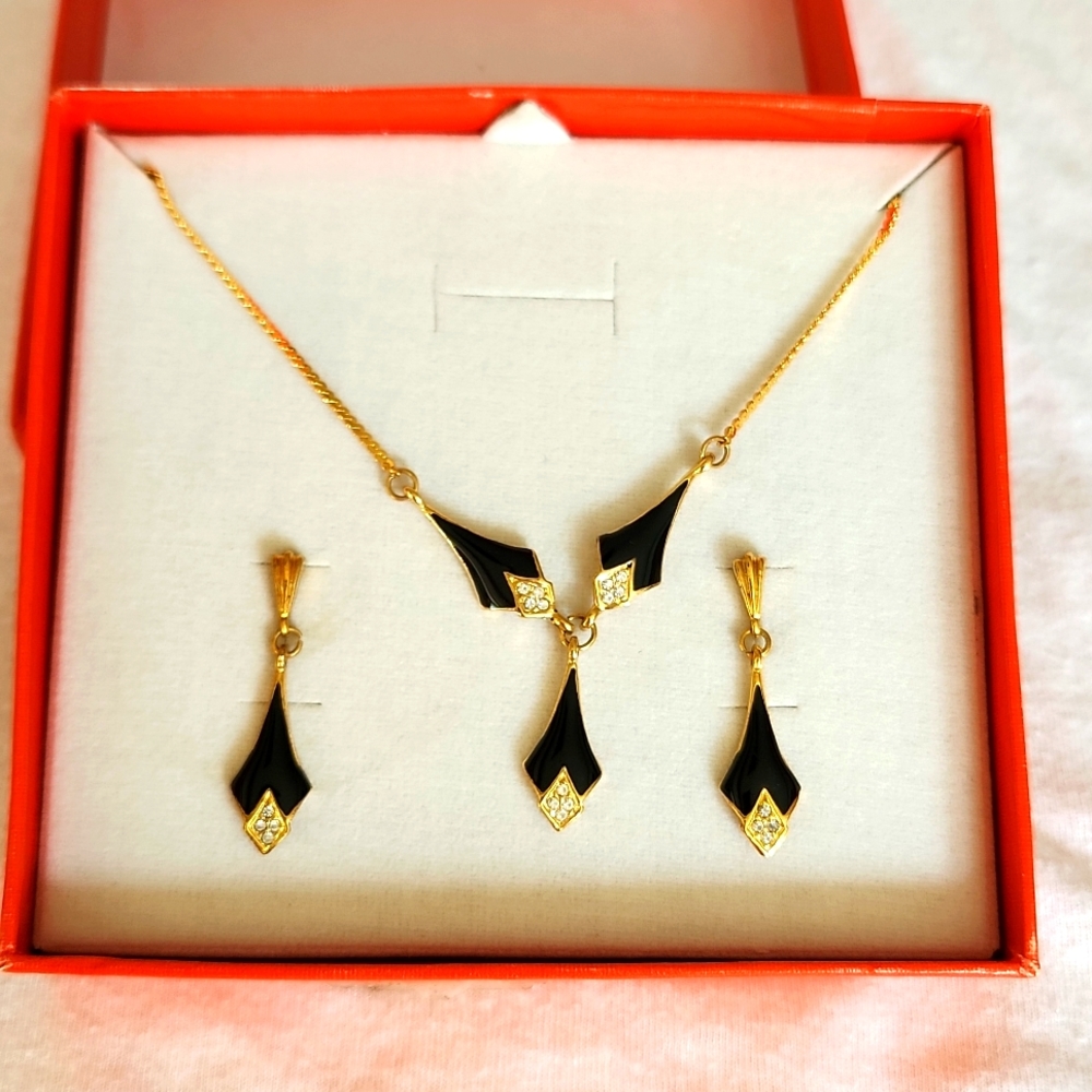 Gold tone on black and Rhinestone necklace and pierced earrings set